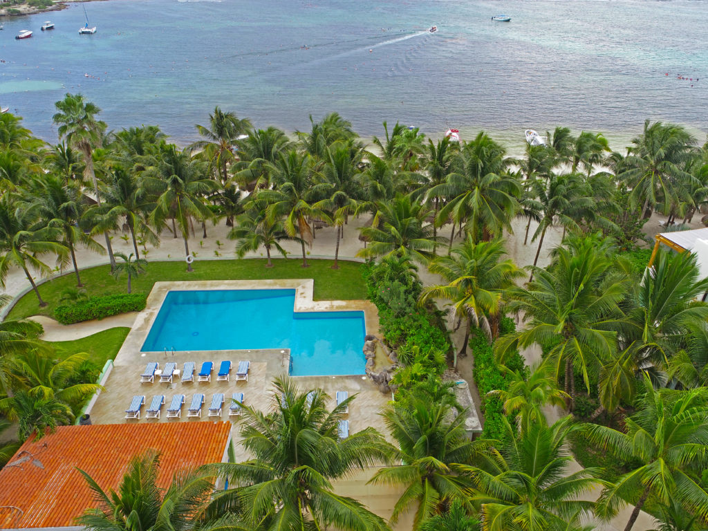 A view of the pool and beach from the sky